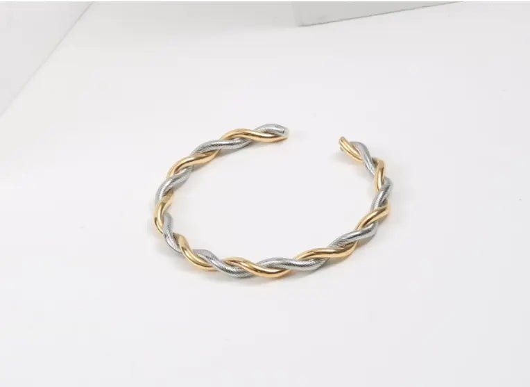 18K guld damearmbånd med geometrisk twist i titaniumstål - StilNord