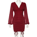 Long Sleeve Backless Pleated Dress with Ruffle Hem