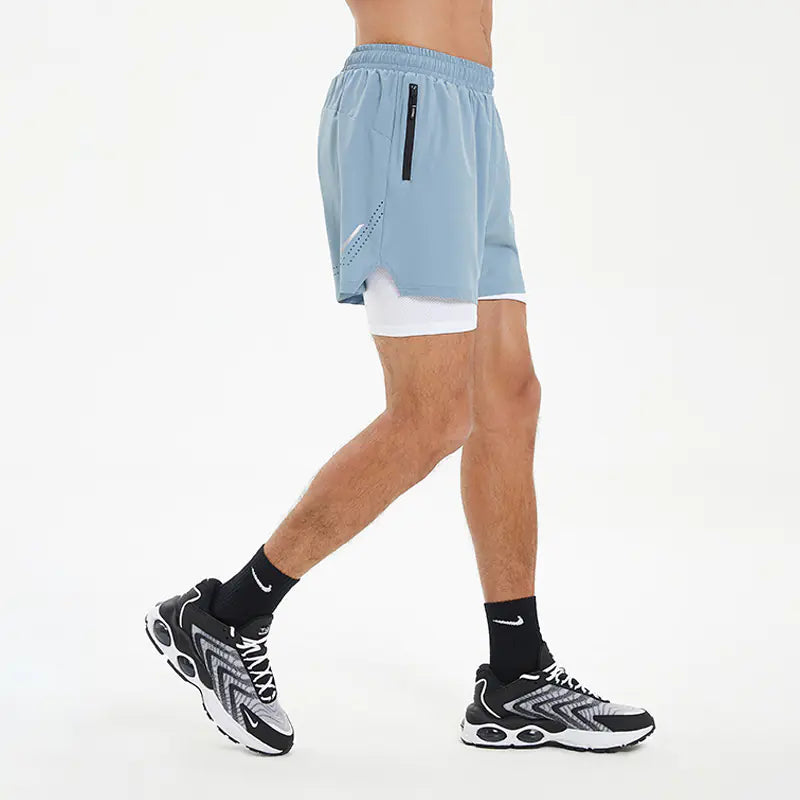 Herre-løbeshorts i to-i-én med hurtigtørrende materiale