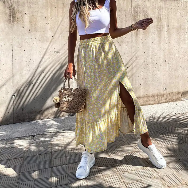 Blomstret maxikjole med flæset elastiktalje-design