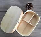 Japansk træbento med opdelte skåle