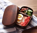 Japanese wooden bento with divided bowls