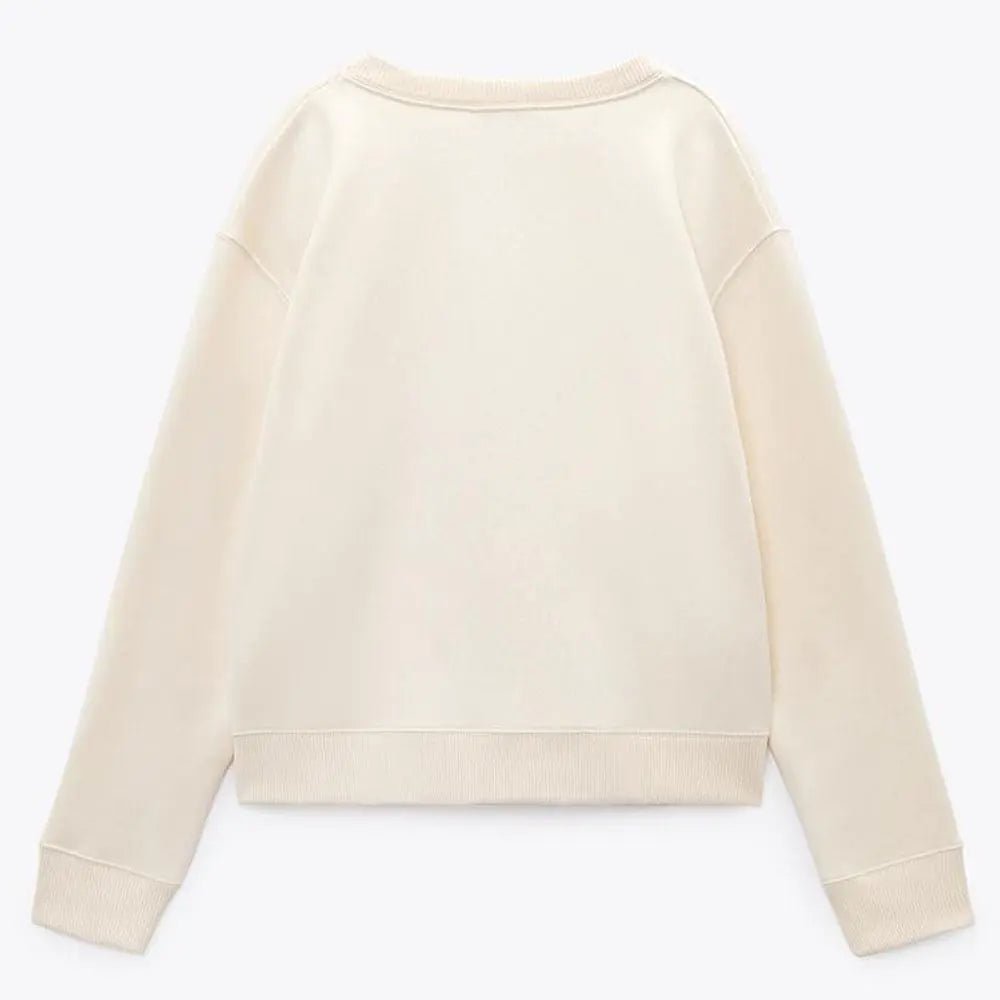 Kvinders rundhalsede, trykte sweater med lange ærmer - StilNord