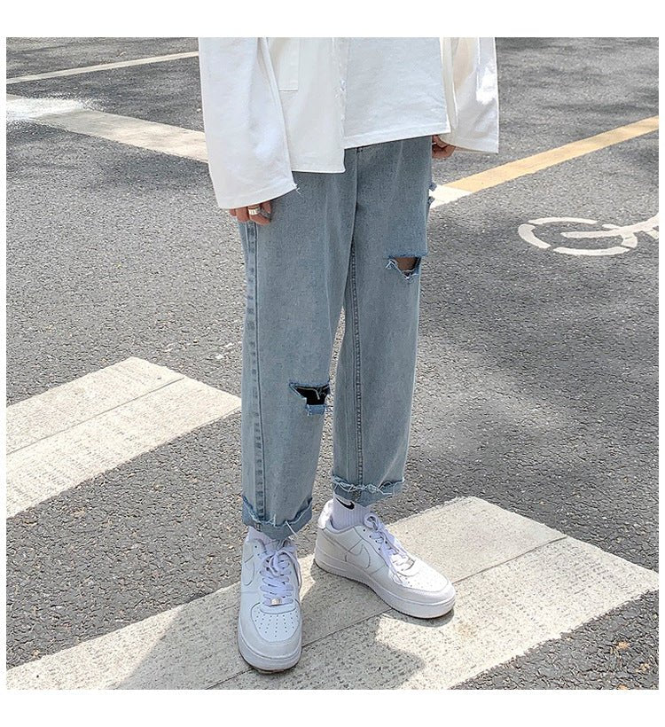 Lige, løstsiddende jeans med slid til mænd - StilNord