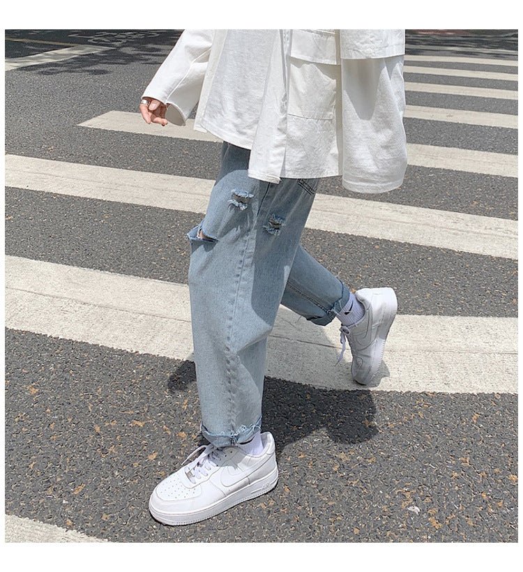 Lige, løstsiddende jeans med slid til mænd - StilNord