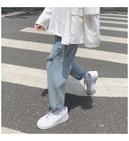 Lige, løstsiddende jeans med slid til mænd - StilNord