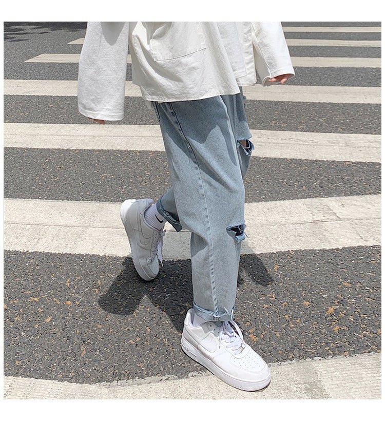 Lige, løstsiddende jeans med slid til mænd - StilNord