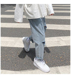 Lige, løstsiddende jeans med slid til mænd - StilNord