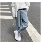 Lige, løstsiddende jeans med slid til mænd - StilNord