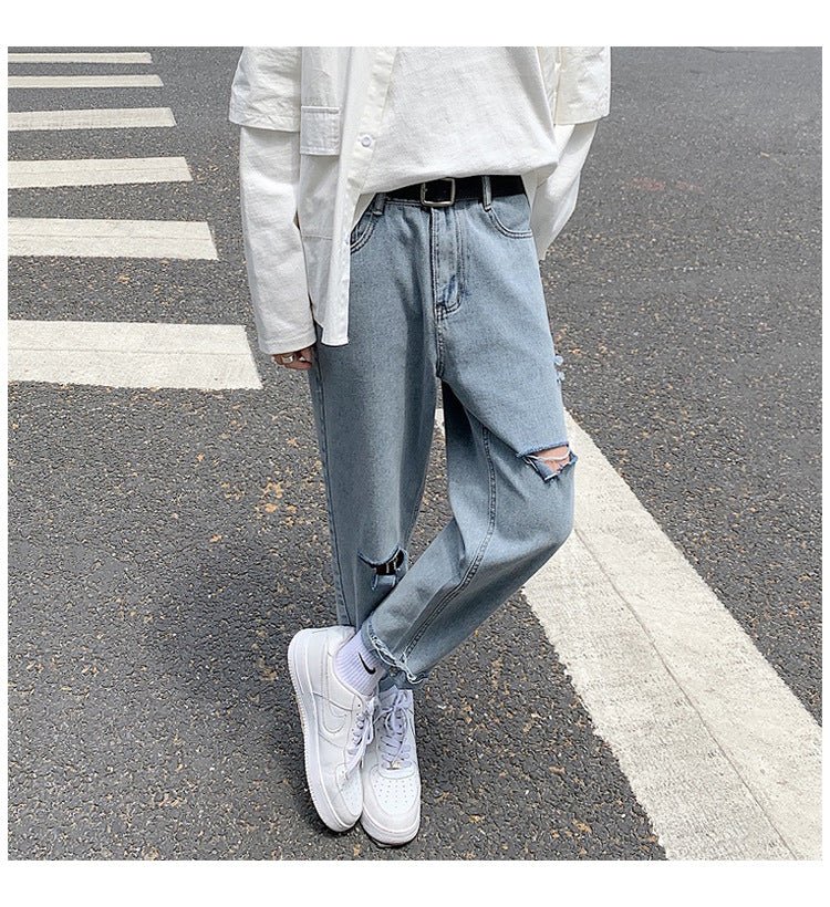 Lige, løstsiddende jeans med slid til mænd - StilNord