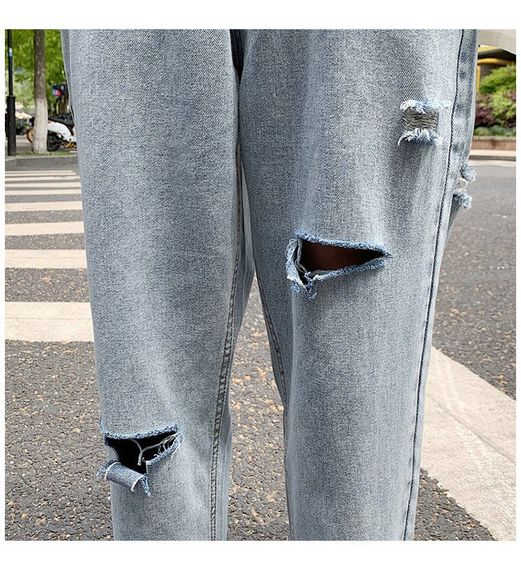 Lige, løstsiddende jeans med slid til mænd - StilNord