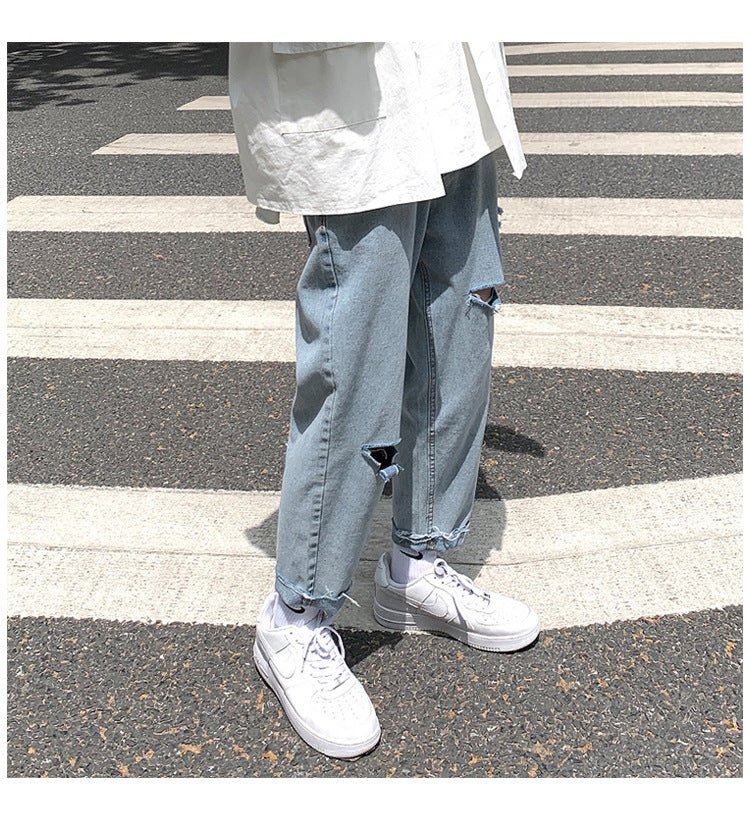 Lige, løstsiddende jeans med slid til mænd - StilNord