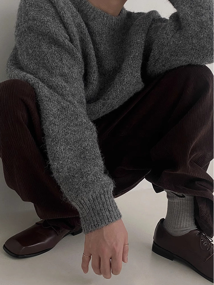 Løstsiddende sweater med drop - skulder og rund hals - StilNord