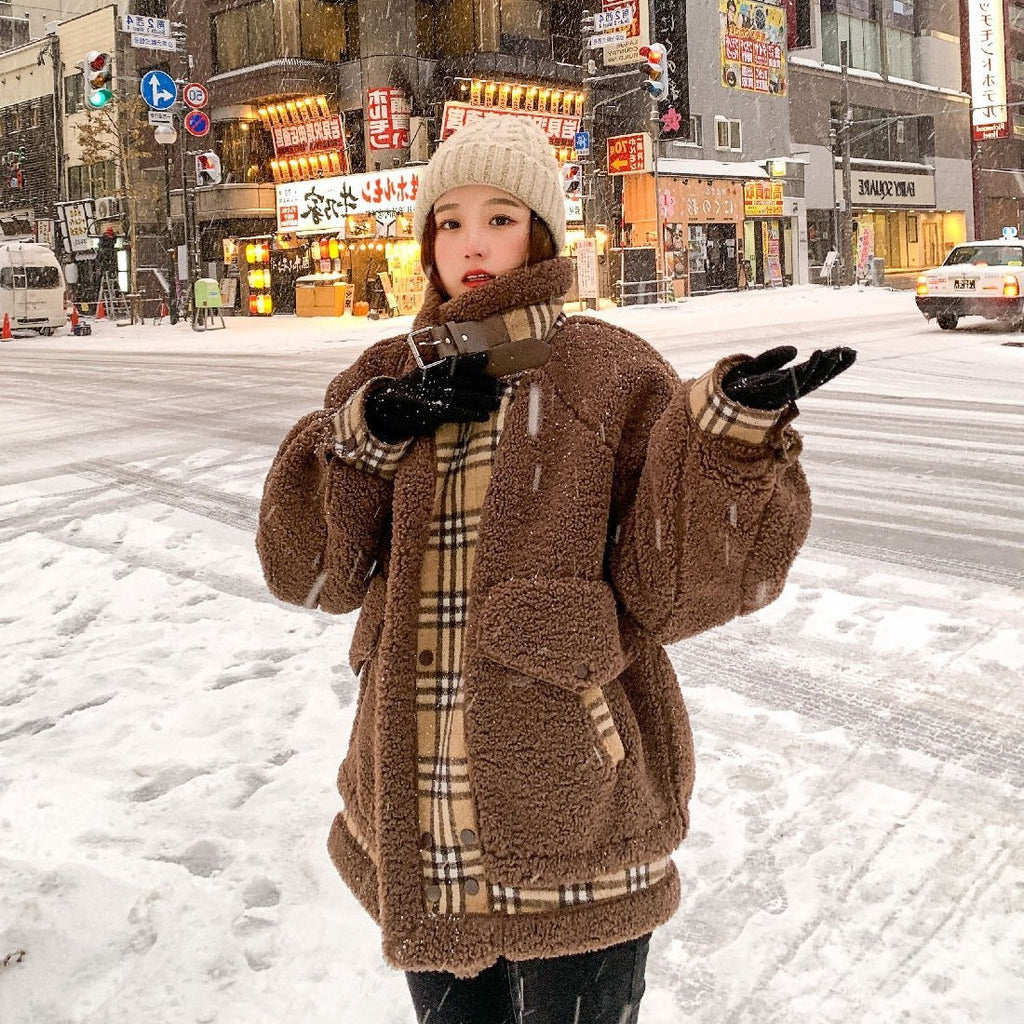 Quiltet lammeuldsfrakke med syningsdetaljer - StilNord